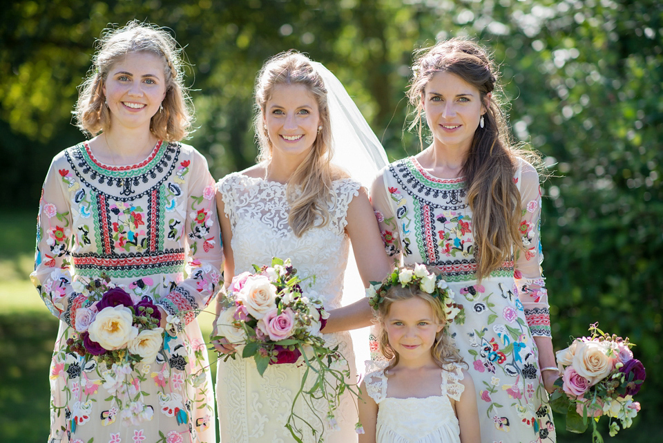 Bride Lou Lou wears a Mori Lee gown for her Sherborne Abbey wedding and garden party reception. Photography by Louise Adby.