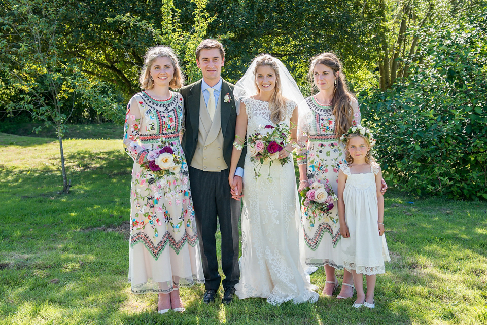 Bride Lou Lou wears a Mori Lee gown for her Sherborne Abbey wedding and garden party reception. Photography by Louise Adby.