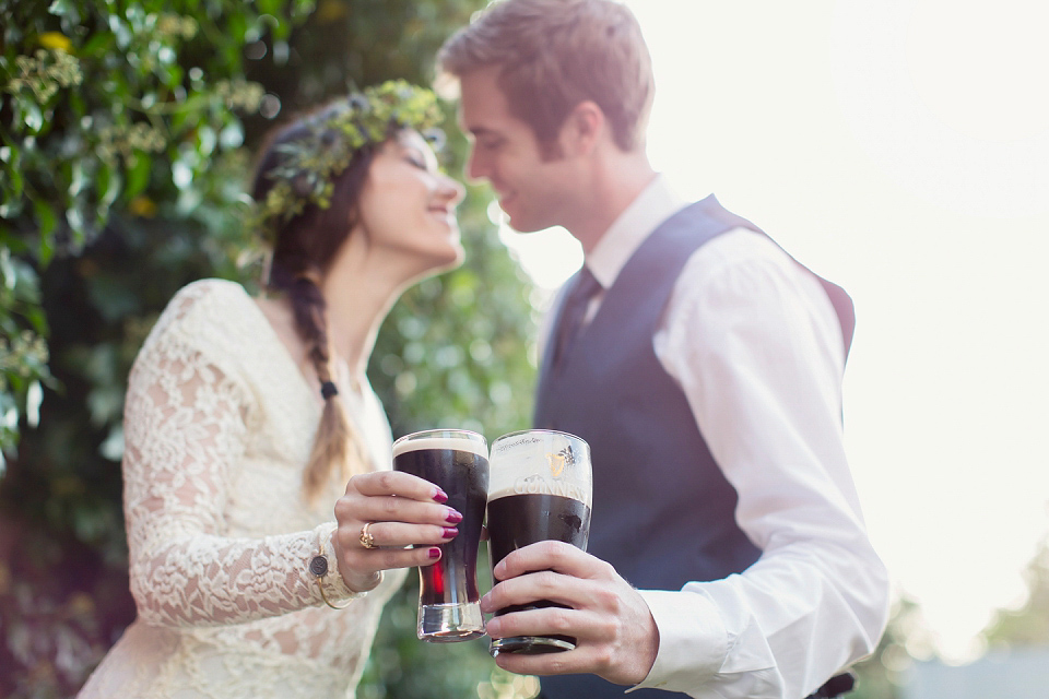 Juliana of Good Juju Ink wears a Marchesa gown for her super tasteful and elegant fairy tale Celtic and Jewish fusion wedding at Ashford Castle. Photography by Craig & Eva Sanders.