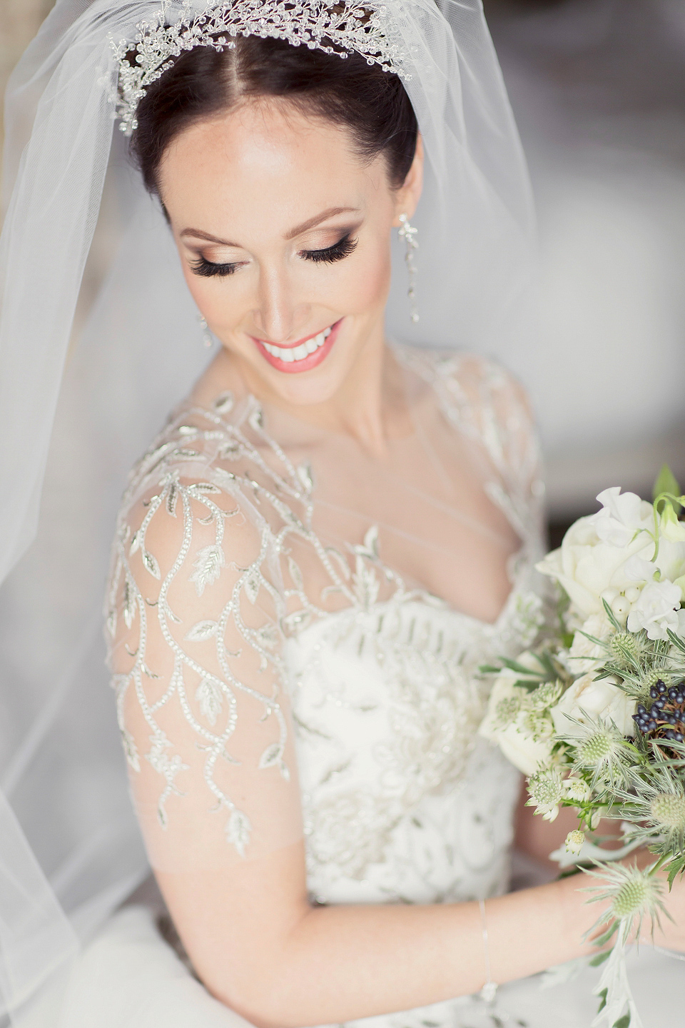 Juliana of Good Juju Ink wears a Marchesa gown for her super tasteful and elegant fairy tale Celtic and Jewish fusion wedding at Ashford Castle. Photography by Craig & Eva Sanders.