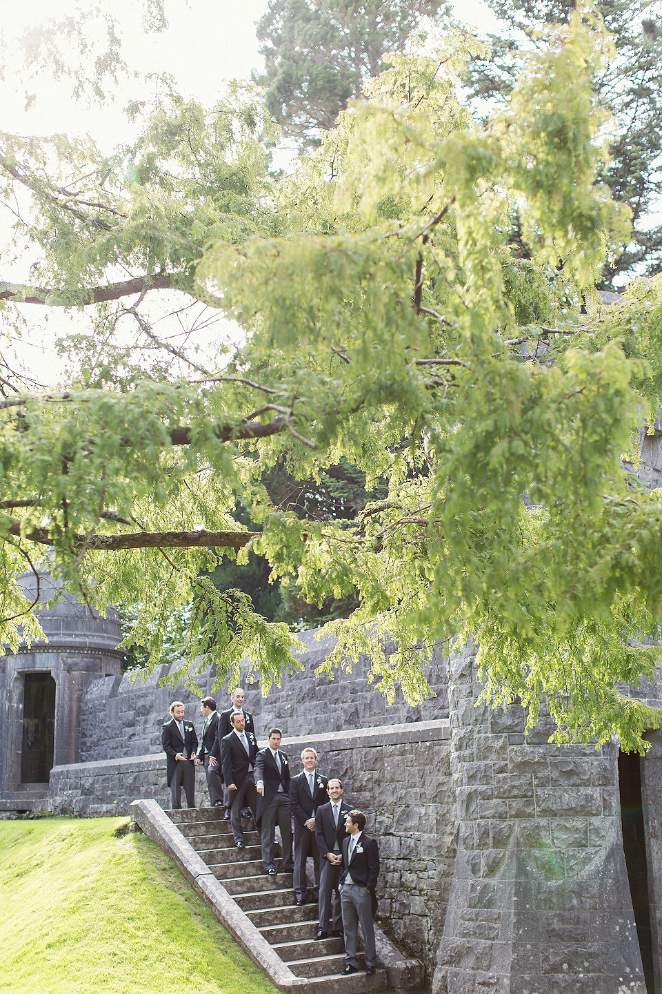 Juliana of Good Juju Ink wears a Marchesa gown for her super tasteful and elegant fairy tale Celtic and Jewish fusion wedding at Ashford Castle. Photography by Craig & Eva Sanders.