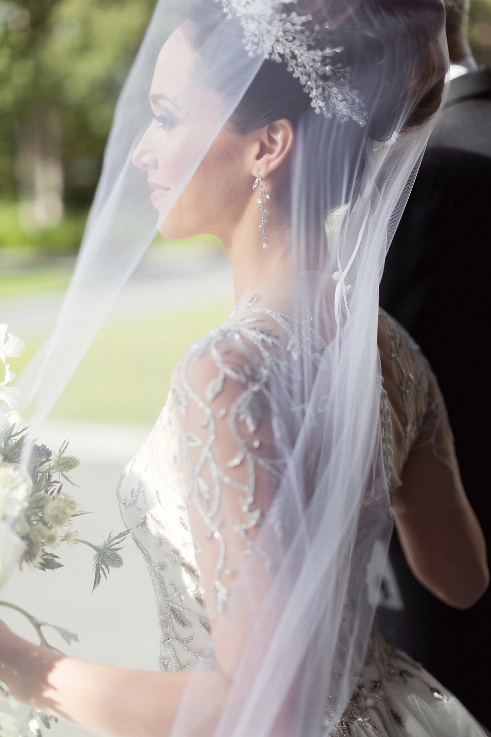 Juliana of Good Juju Ink wears a Marchesa gown for her super tasteful and elegant fairy tale Celtic and Jewish fusion wedding at Ashford Castle. Photography by Craig & Eva Sanders.