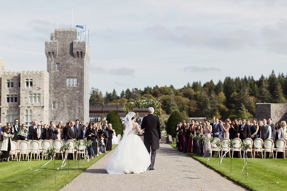 Juliana of Good Juju Ink wears a Marchesa gown for her super tasteful and elegant fairy tale Celtic and Jewish fusion wedding at Ashford Castle. Photography by Craig & Eva Sanders.