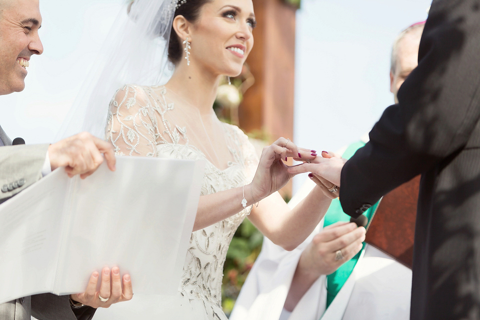 Juliana of Good Juju Ink wears a Marchesa gown for her super tasteful and elegant fairy tale Celtic and Jewish fusion wedding at Ashford Castle. Photography by Craig & Eva Sanders.