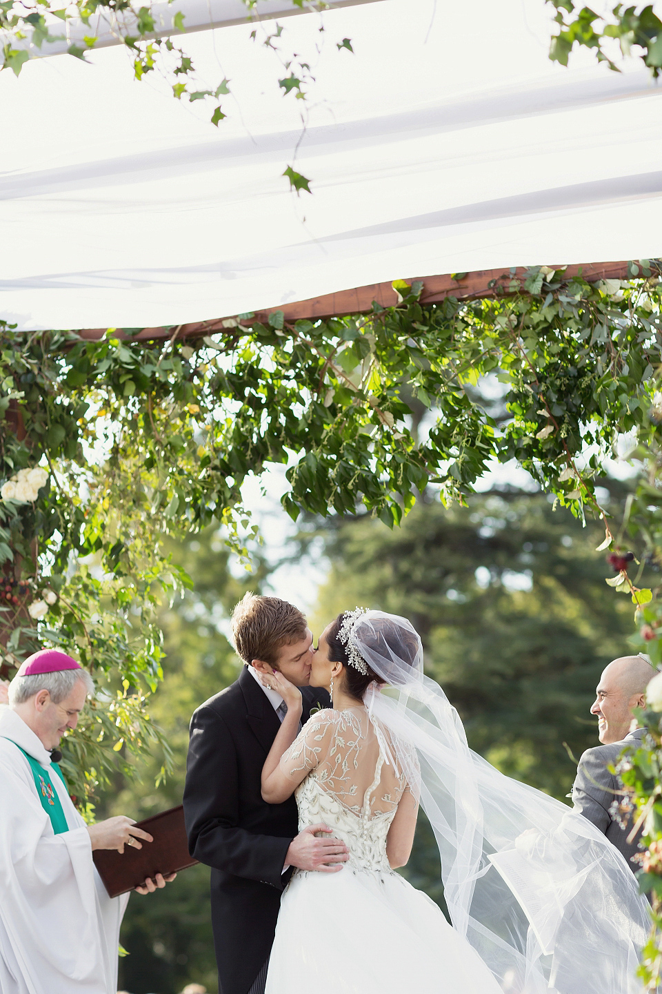 Juliana of Good Juju Ink wears a Marchesa gown for her super tasteful and elegant fairy tale Celtic and Jewish fusion wedding at Ashford Castle. Photography by Craig & Eva Sanders.