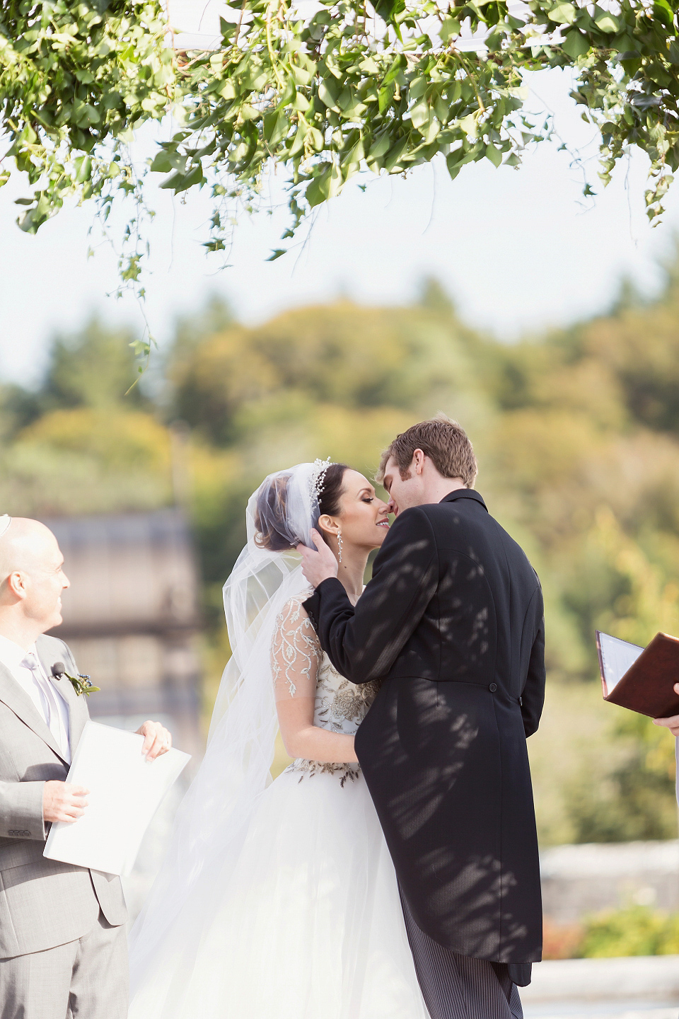 Juliana of Good Juju Ink wears a Marchesa gown for her super tasteful and elegant fairy tale Celtic and Jewish fusion wedding at Ashford Castle. Photography by Craig & Eva Sanders.