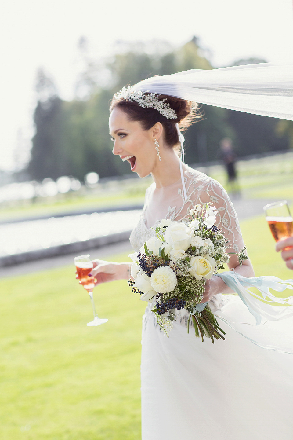 Juliana of Good Juju Ink wears a Marchesa gown for her super tasteful and elegant fairy tale Celtic and Jewish fusion wedding at Ashford Castle. Photography by Craig & Eva Sanders.