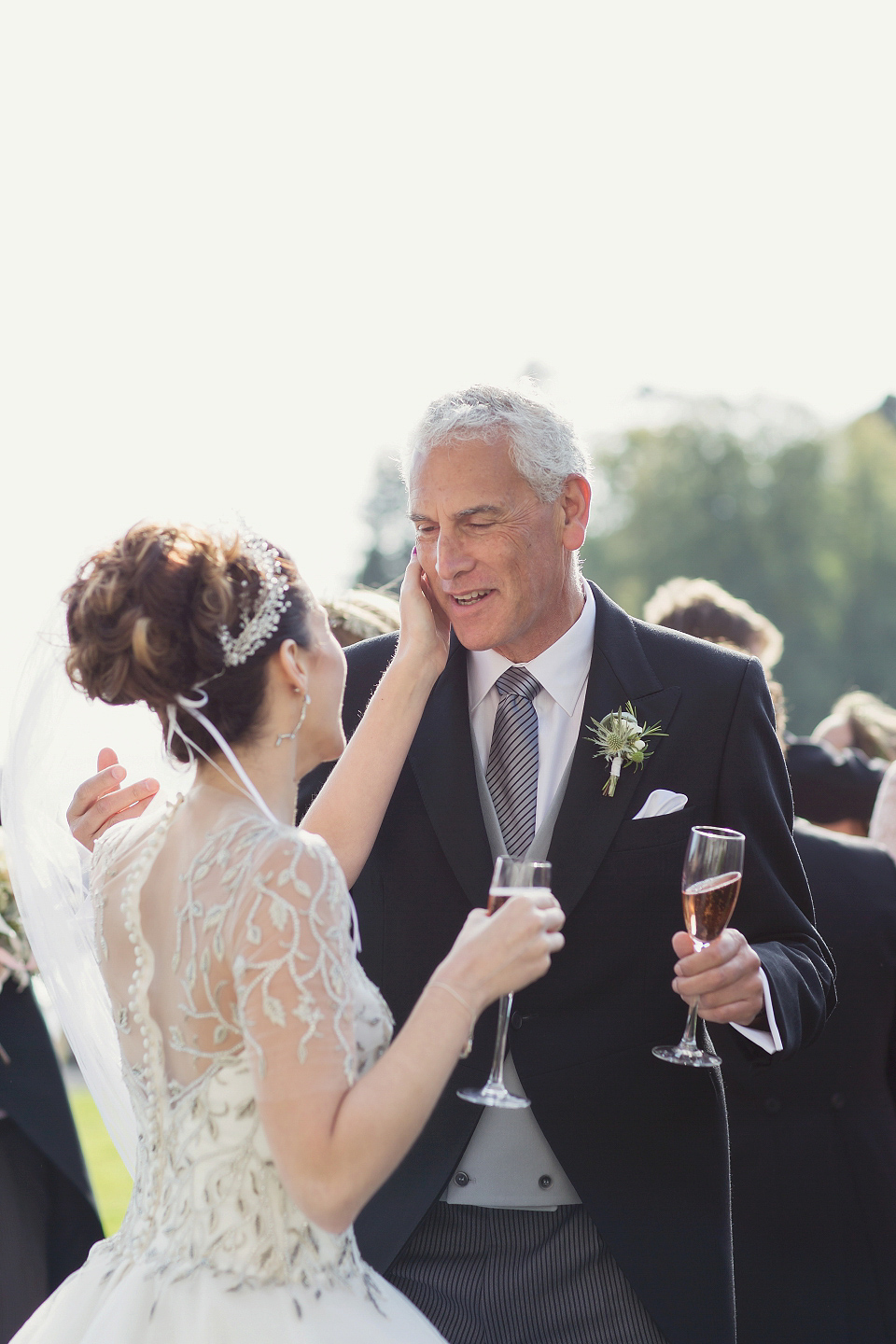 Juliana of Good Juju Ink wears a Marchesa gown for her super tasteful and elegant fairy tale Celtic and Jewish fusion wedding at Ashford Castle. Photography by Craig & Eva Sanders.