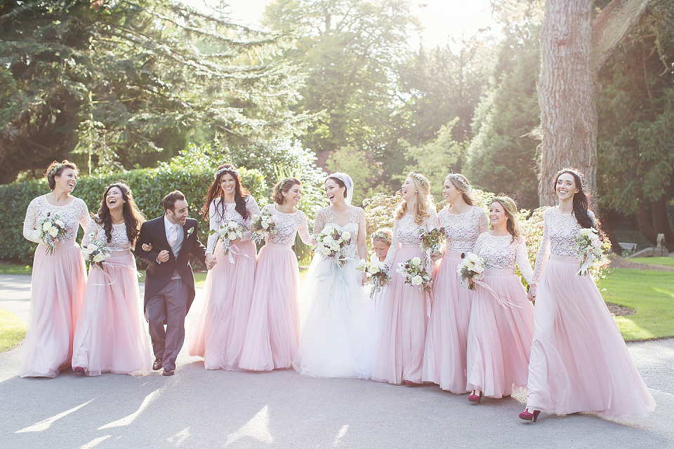 Juliana of Good Juju Ink wears a Marchesa gown for her super tasteful and elegant fairy tale Celtic and Jewish fusion wedding at Ashford Castle. Photography by Craig & Eva Sanders.