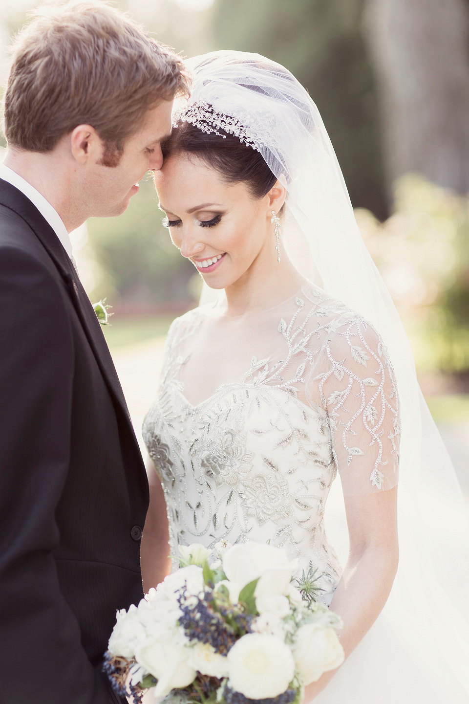 Juliana of Good Juju Ink wears a Marchesa gown for her super tasteful and elegant fairy tale Celtic and Jewish fusion wedding at Ashford Castle. Photography by Craig & Eva Sanders.