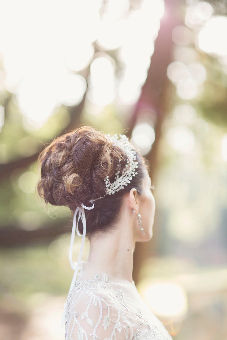 Juliana of Good Juju Ink wears a Marchesa gown for her super tasteful and elegant fairy tale Celtic and Jewish fusion wedding at Ashford Castle. Photography by Craig & Eva Sanders.