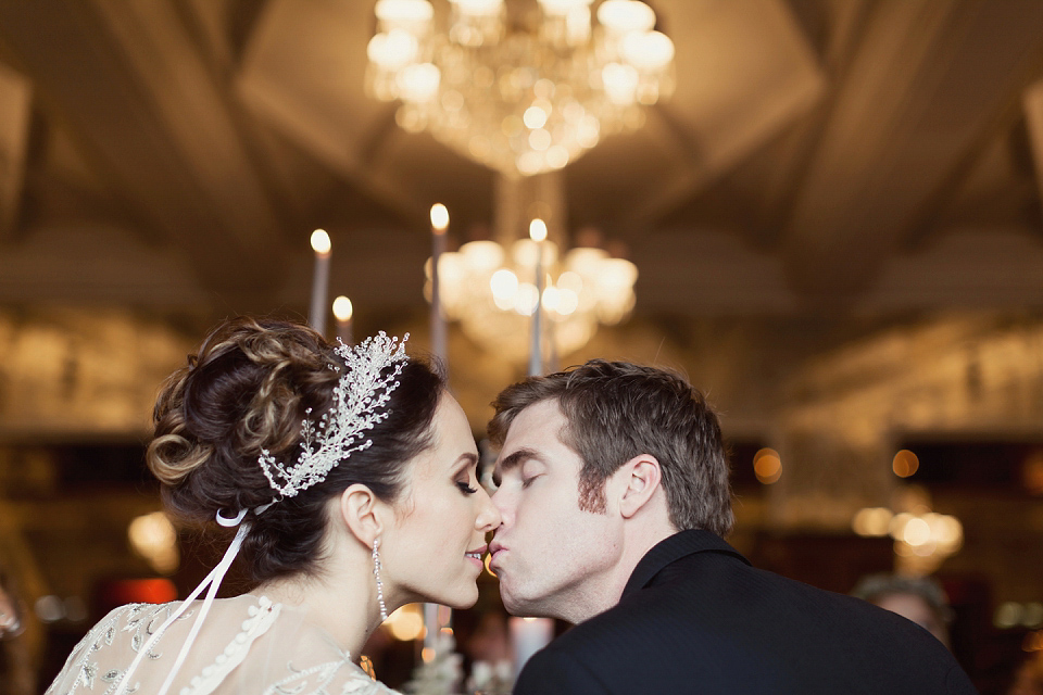 Juliana of Good Juju Ink wears a Marchesa gown for her super tasteful and elegant fairy tale Celtic and Jewish fusion wedding at Ashford Castle. Photography by Craig & Eva Sanders.