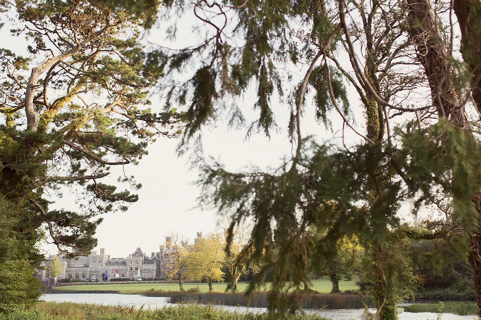 Juliana of Good Juju Ink wears a Marchesa gown for her super tasteful and elegant fairy tale Celtic and Jewish fusion wedding at Ashford Castle. Photography by Craig & Eva Sanders.