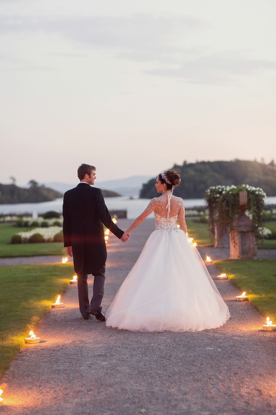 Juliana of Good Juju Ink wears a Marchesa gown for her super tasteful and elegant fairy tale Celtic and Jewish fusion wedding at Ashford Castle. Photography by Craig & Eva Sanders.