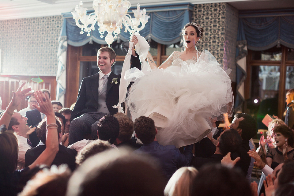 Juliana of Good Juju Ink wears a Marchesa gown for her super tasteful and elegant fairy tale Celtic and Jewish fusion wedding at Ashford Castle. Photography by Craig & Eva Sanders.