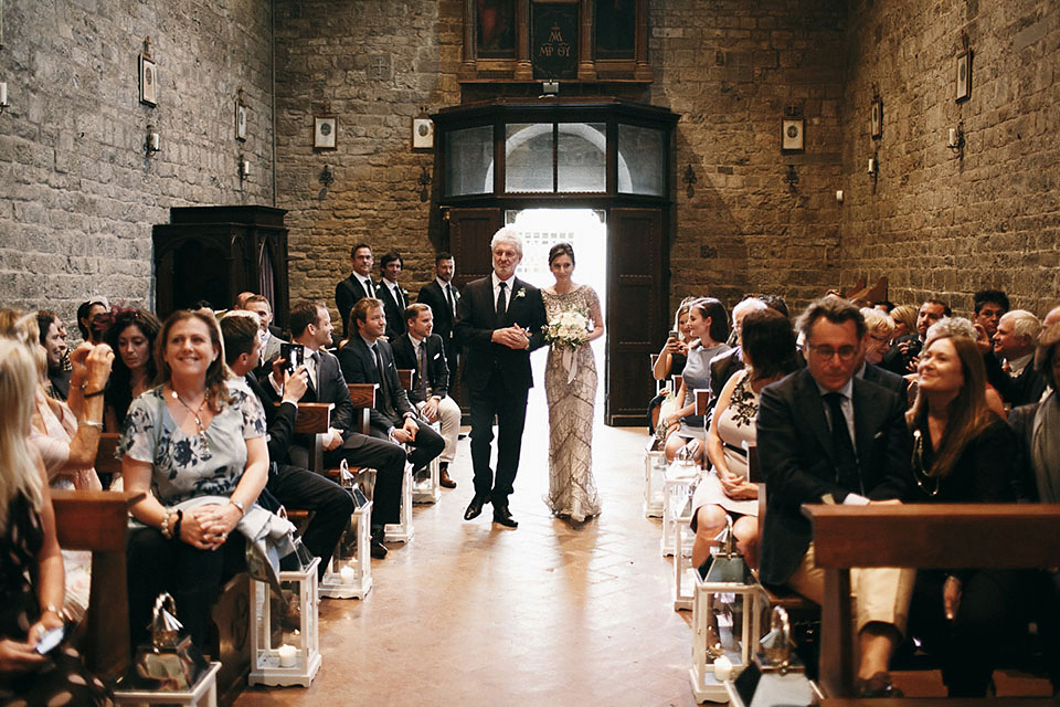 Amelia wore a beaded gown by Eliza Jane Howell for her September wedding in Tuscany. Photograph by Matteo Crescentini, styling and wedding planning by The Knot Italy.