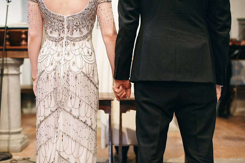 Amelia wore a beaded gown by Eliza Jane Howell for her September wedding in Tuscany. Photograph by Matteo Crescentini, styling and wedding planning by The Knot Italy.