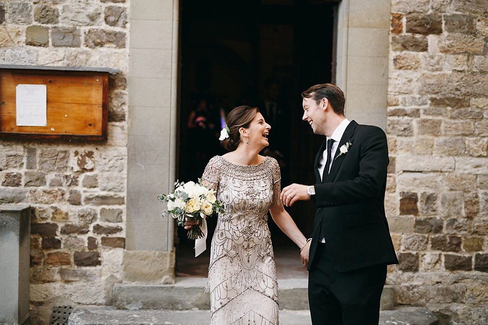 Amelia wore a beaded gown by Eliza Jane Howell for her September wedding in Tuscany. Photograph by Matteo Crescentini, styling and wedding planning by The Knot Italy.