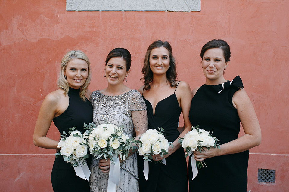 Amelia wore a beaded gown by Eliza Jane Howell for her September wedding in Tuscany. Photograph by Matteo Crescentini, styling and wedding planning by The Knot Italy.