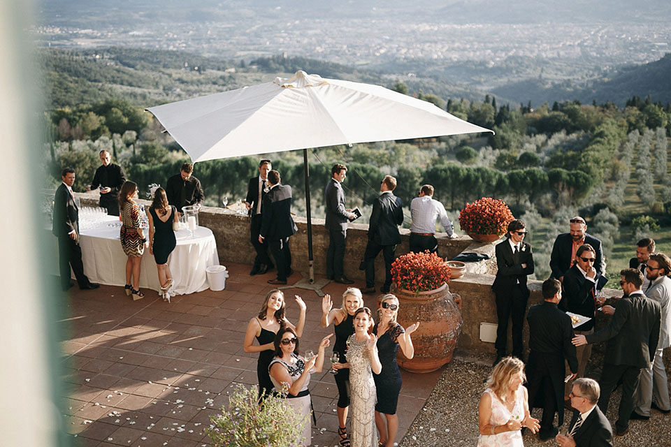 Amelia wore a beaded gown by Eliza Jane Howell for her September wedding in Tuscany. Photograph by Matteo Crescentini, styling and wedding planning by The Knot Italy.