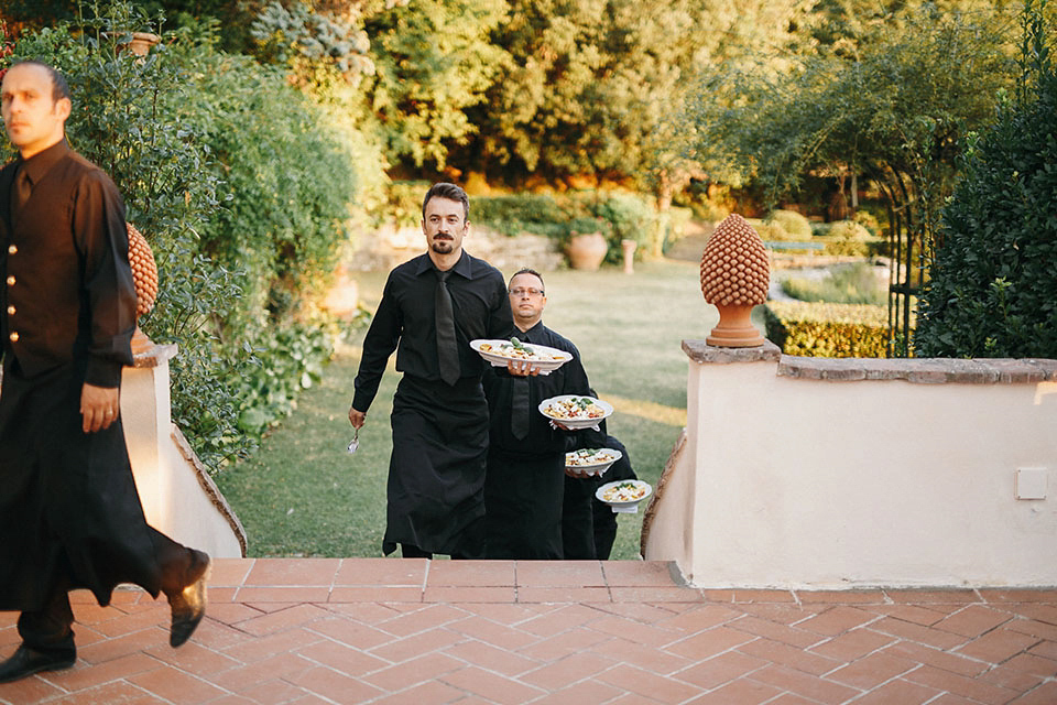 Amelia wore a beaded gown by Eliza Jane Howell for her September wedding in Tuscany. Photograph by Matteo Crescentini, styling and wedding planning by The Knot Italy.