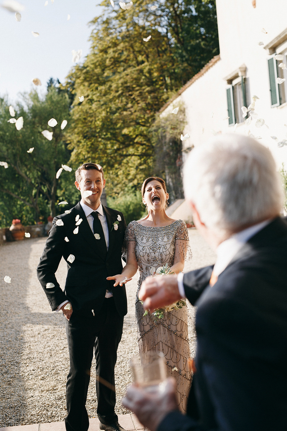 Amelia wore a beaded gown by Eliza Jane Howell for her September wedding in Tuscany. Photograph by Matteo Crescentini, styling and wedding planning by The Knot Italy.