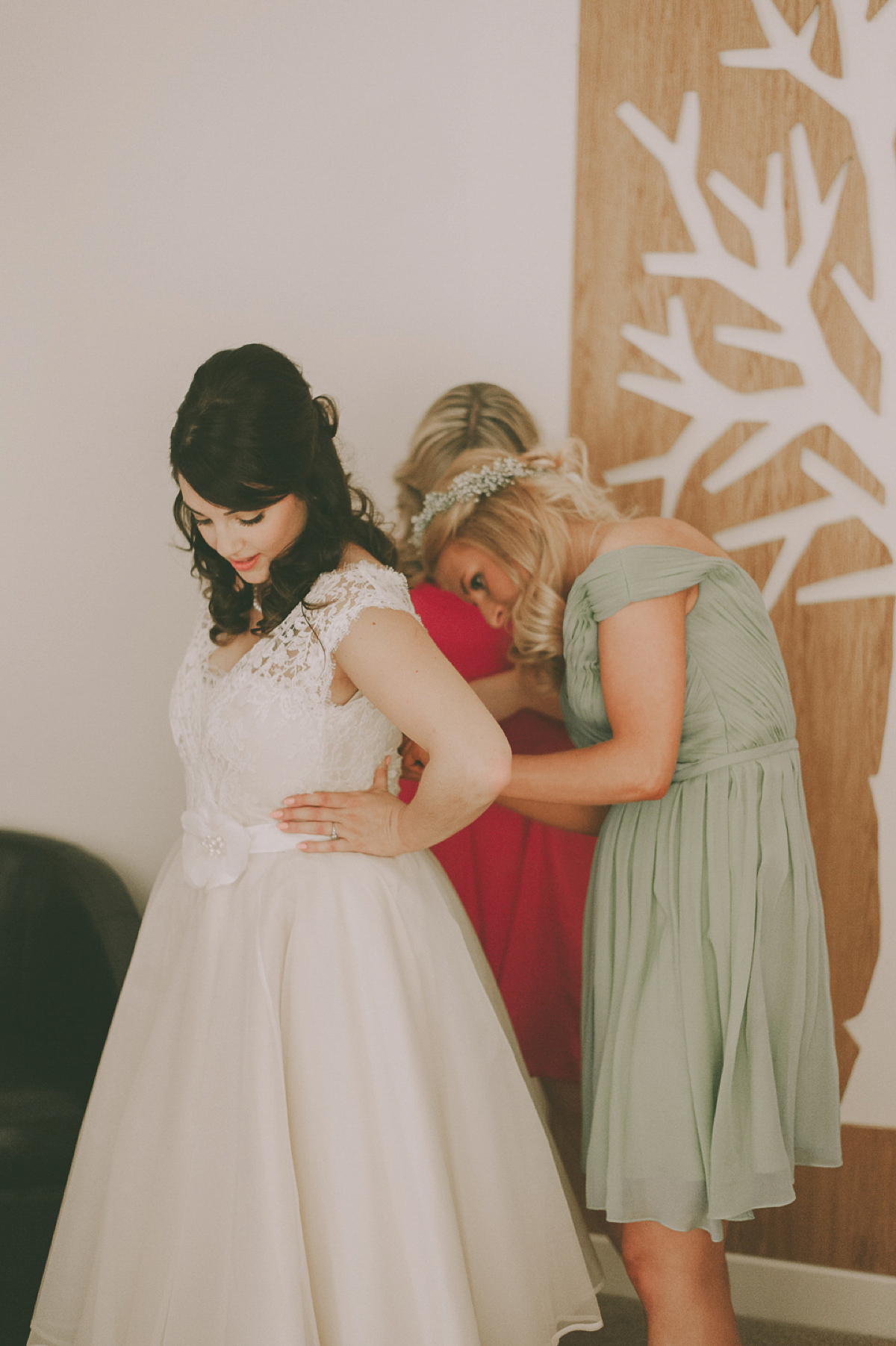 Green shoes ane a 50's inspired dress for a vintage barn wedding in the Cotswolds. Dress by Joanne Fleming, photography by Nabeel's Camera.