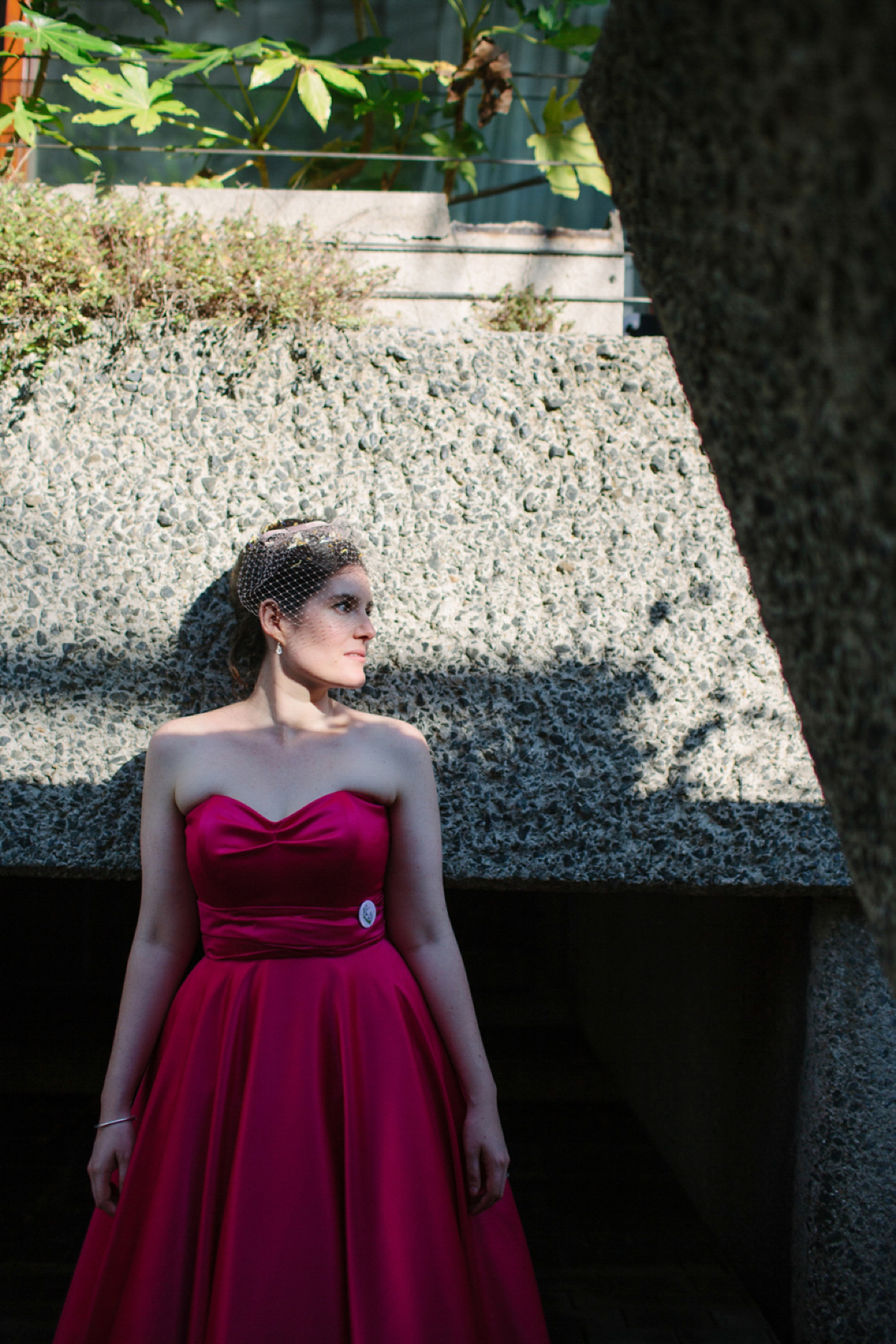 A pink Candy Anthony dress for a colourful and modern wedding at The Barbican. Photography by Joanna Brown.