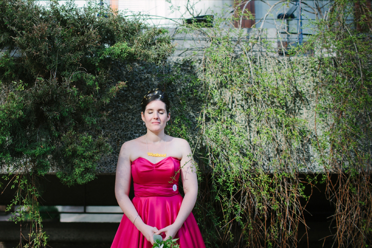 A pink Candy Anthony dress for a colourful and modern wedding at The Barbican. Photography by Joanna Brown.