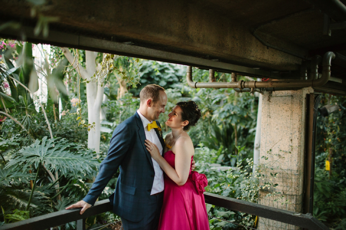 A pink Candy Anthony dress for a colourful and modern wedding at The Barbican. Photography by Joanna Brown.
