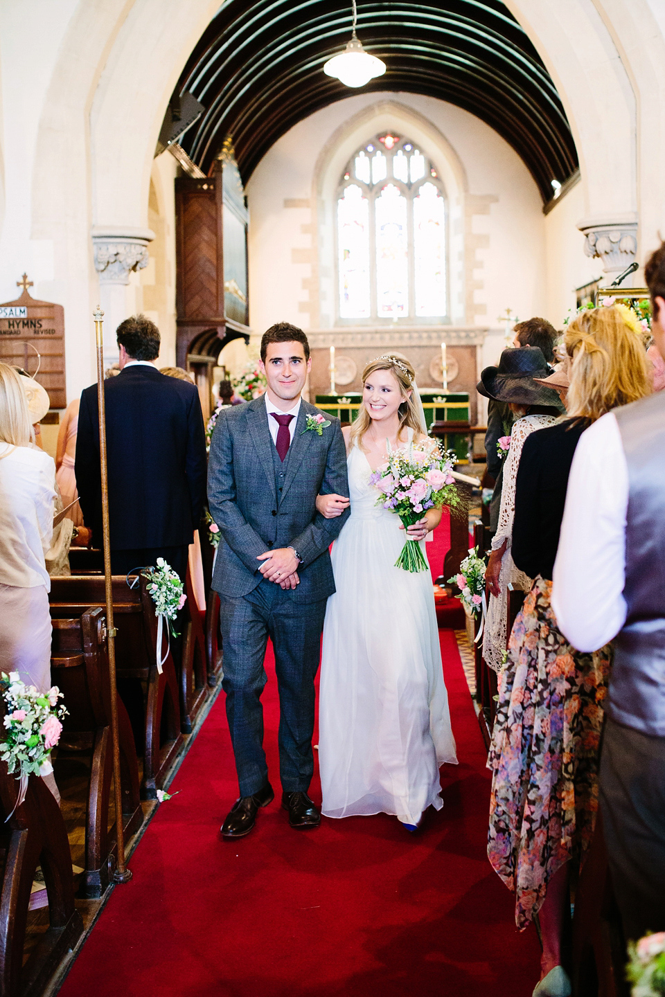 Laurie wore a Belle and Bunty gown for her relaxed and rustic wedding on the family farm. Photography by Hayley Savage.