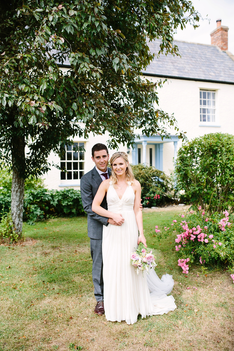 Laurie wore a Belle and Bunty gown for her relaxed and rustic wedding on the family farm. Photography by Hayley Savage.