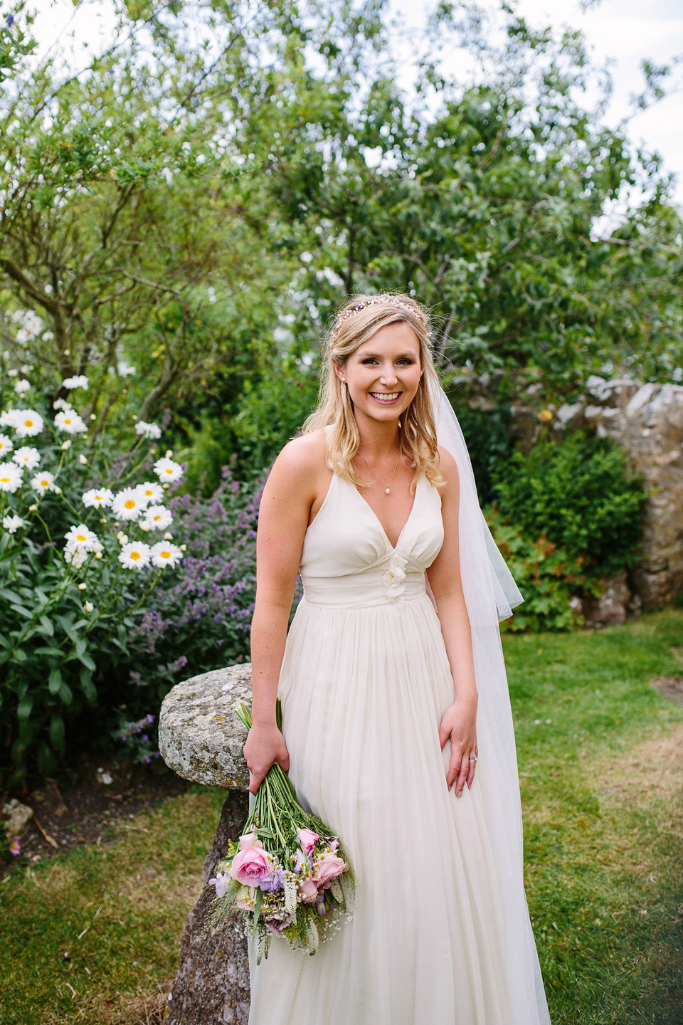 Laurie wore a Belle and Bunty gown for her relaxed and rustic wedding on the family farm. Photography by Hayley Savage.