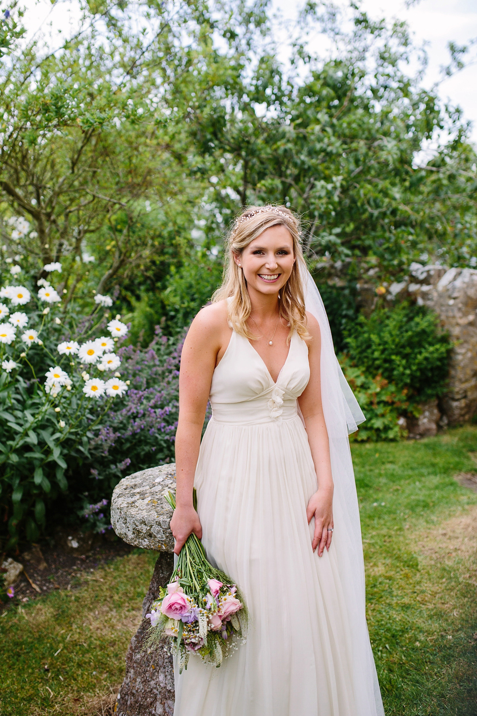 Laurie wore a Belle and Bunty gown for her relaxed and rustic wedding on the family farm. Photography by Hayley Savage.