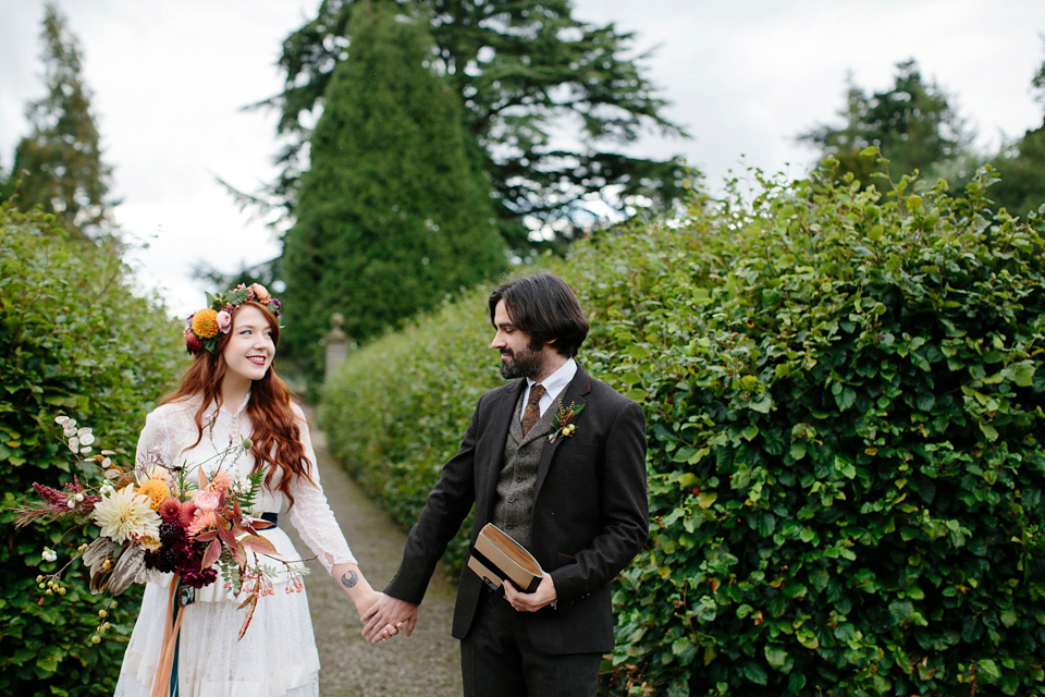 A Humanist woodland wedding for an ethereal, flame haired 1940's inspired bride. Photography by Caro Weiss, film by Sugar8.