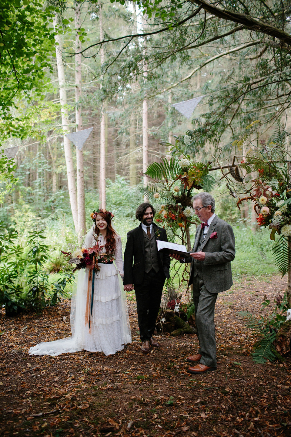 A Humanist woodland wedding for an ethereal, flame haired 1940's inspired bride. Photography by Caro Weiss, film by Sugar8.