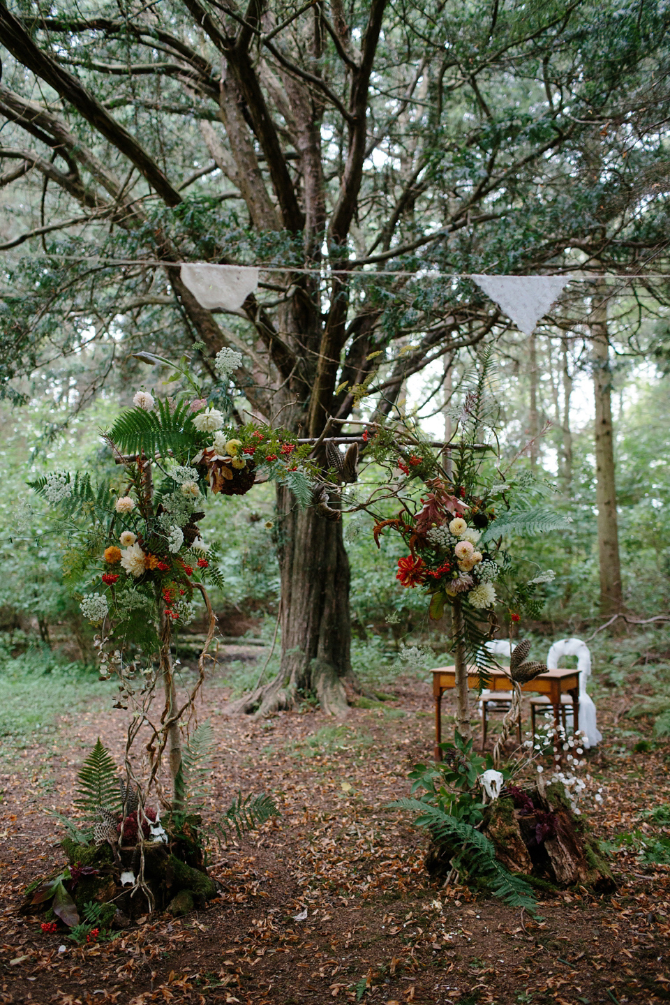 A Humanist woodland wedding for an ethereal, flame haired 1940's inspired bride. Photography by Caro Weiss, film by Sugar8.