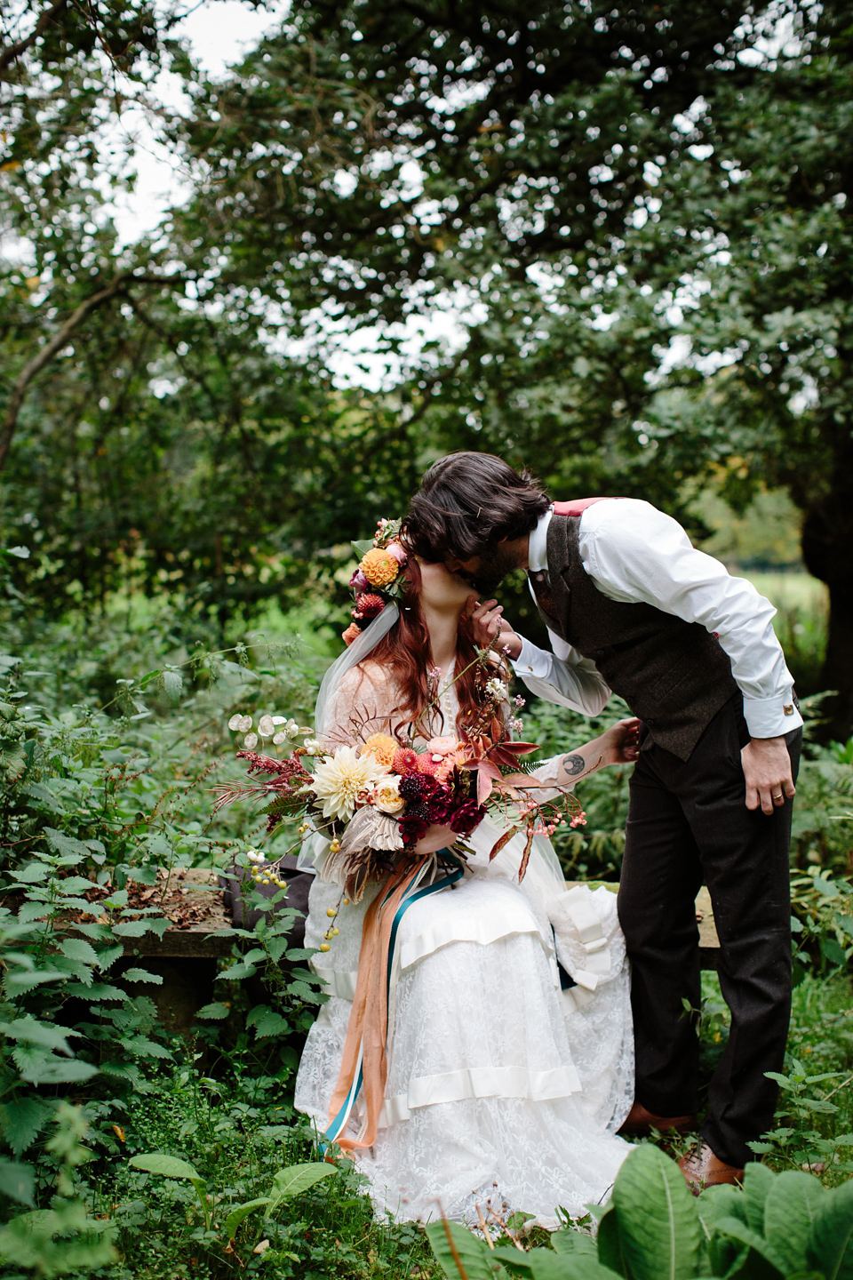 A Humanist woodland wedding for an ethereal, flame haired 1940's inspired bride. Photography by Caro Weiss, film by Sugar8.