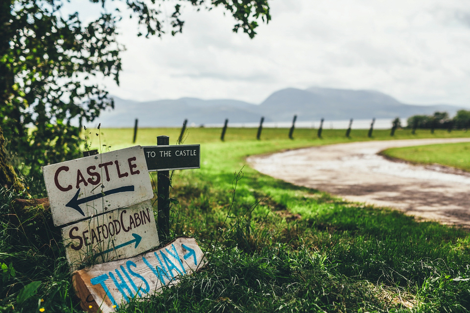 Emma wears a Temperley London gown for her wedding with 'The Travelling Barn Company' at the Skipness Estate in Scotland. Photography by Lisa Devine.
