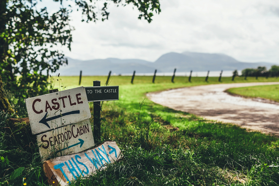 Emma wears a Temperley London gown for her wedding with 'The Travelling Barn Company' at the Skipness Estate in Scotland. Photography by Lisa Devine.