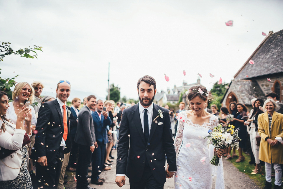 Emma wears a Temperley London gown for her wedding with 'The Travelling Barn Company' at the Skipness Estate in Scotland. Photography by Lisa Devine.