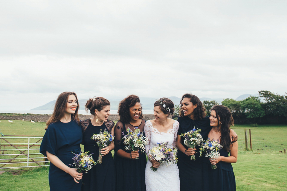 Emma wears a Temperley London gown for her wedding with 'The Travelling Barn Company' at the Skipness Estate in Scotland. Photography by Lisa Devine.