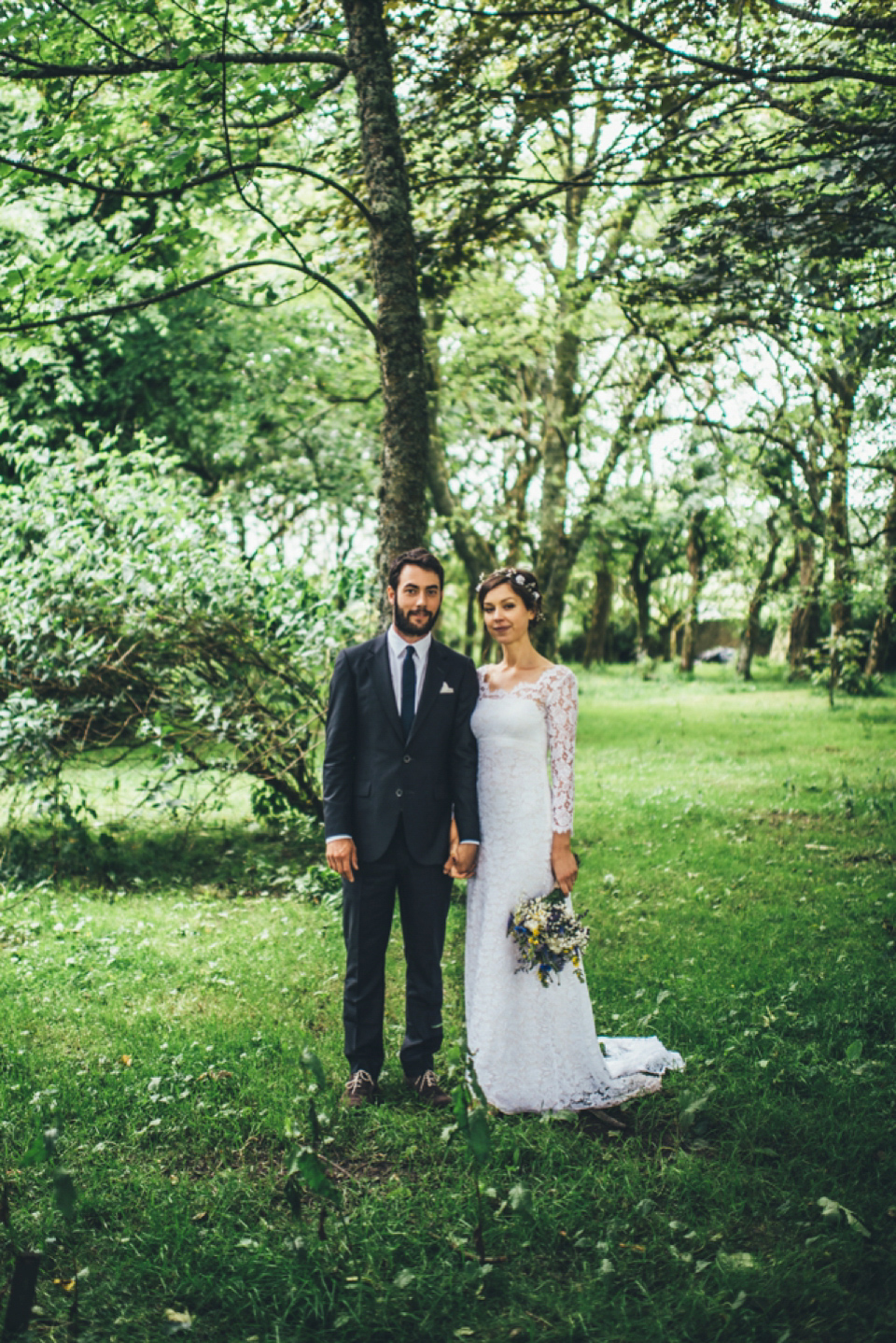 Emma wears a Temperley London gown for her wedding with 'The Travelling Barn Company' at the Skipness Estate in Scotland. Photography by Lisa Devine.