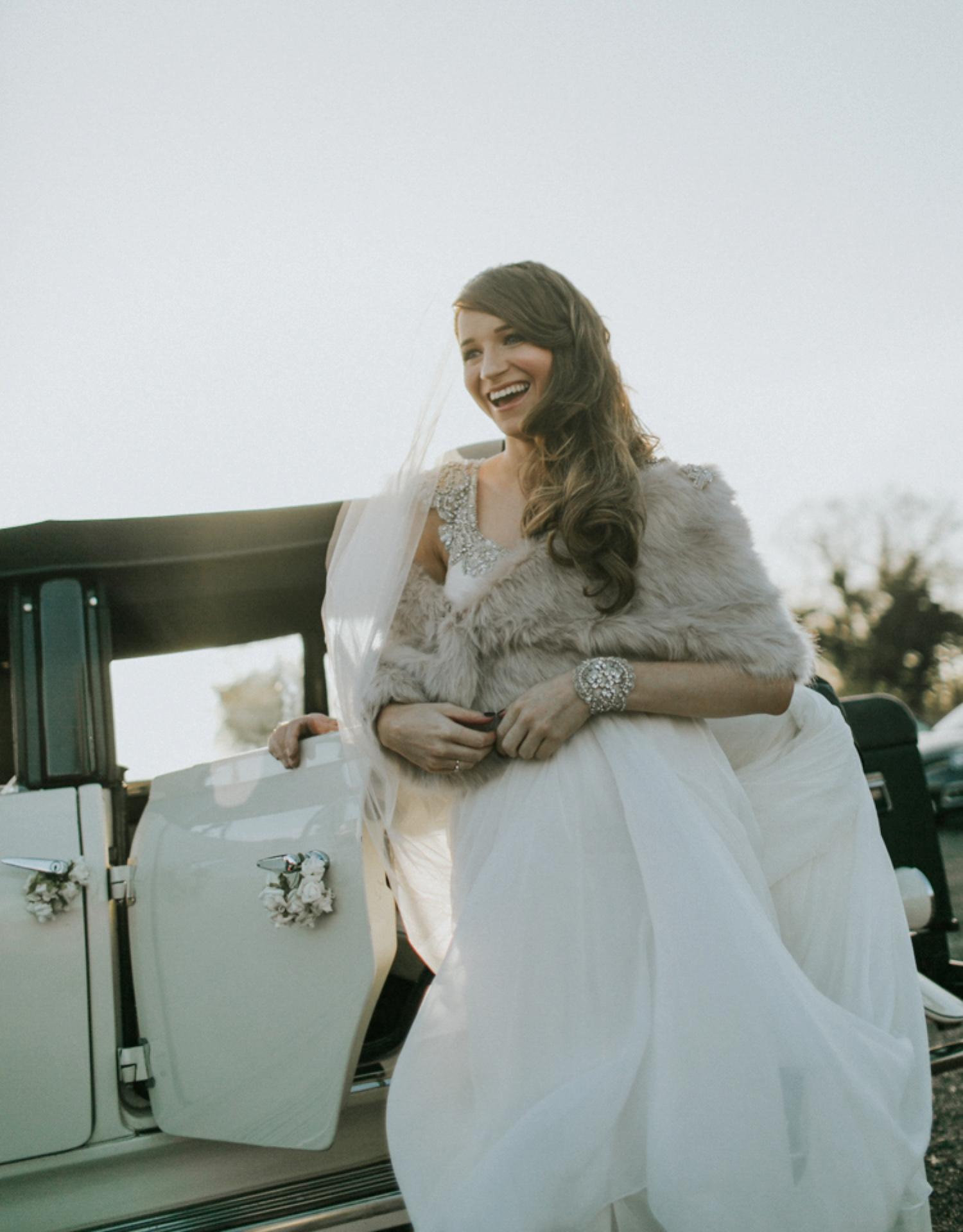 Alicia wore an Anna Campbell gown for her 1920's inspired rustic winter wedding. Photography by DSB Creative.