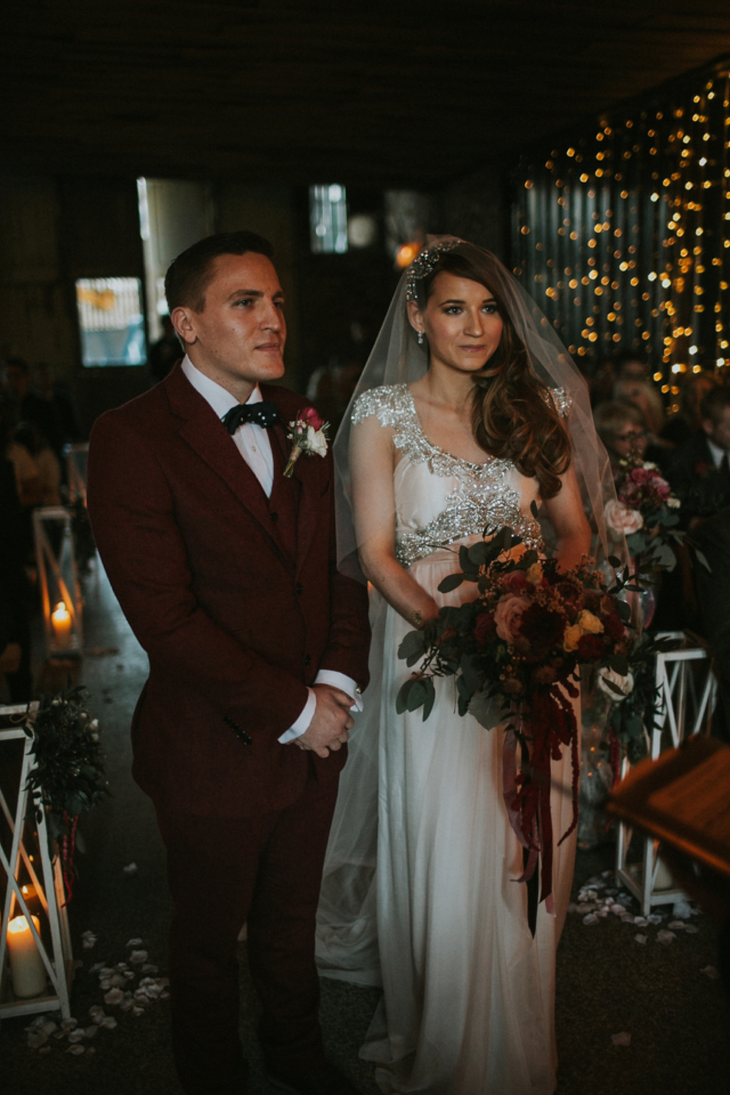 Alicia wore an Anna Campbell gown for her 1920's inspired rustic winter wedding. Photography by DSB Creative.