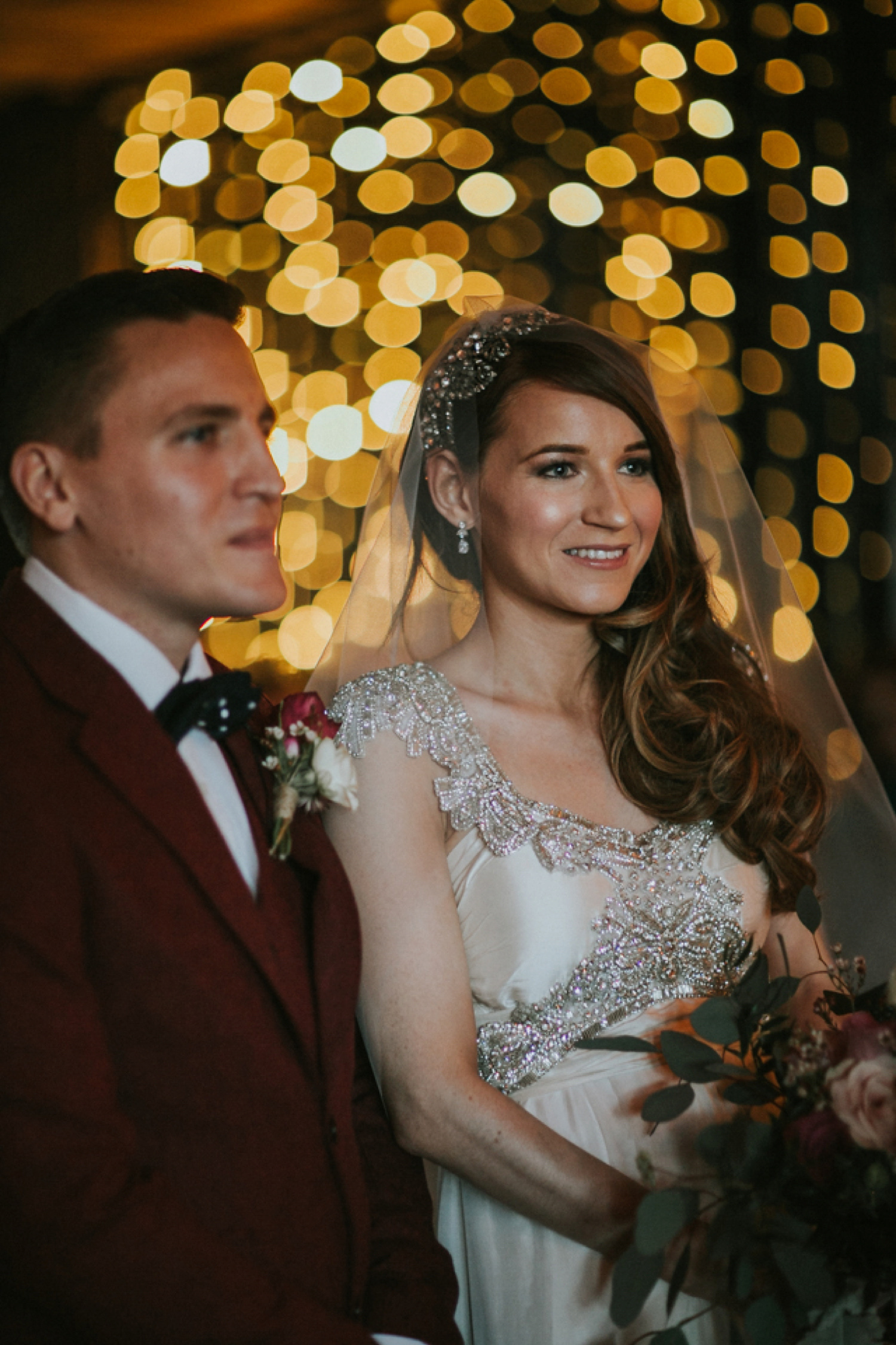 Alicia wore an Anna Campbell gown for her 1920's inspired rustic winter wedding. Photography by DSB Creative.