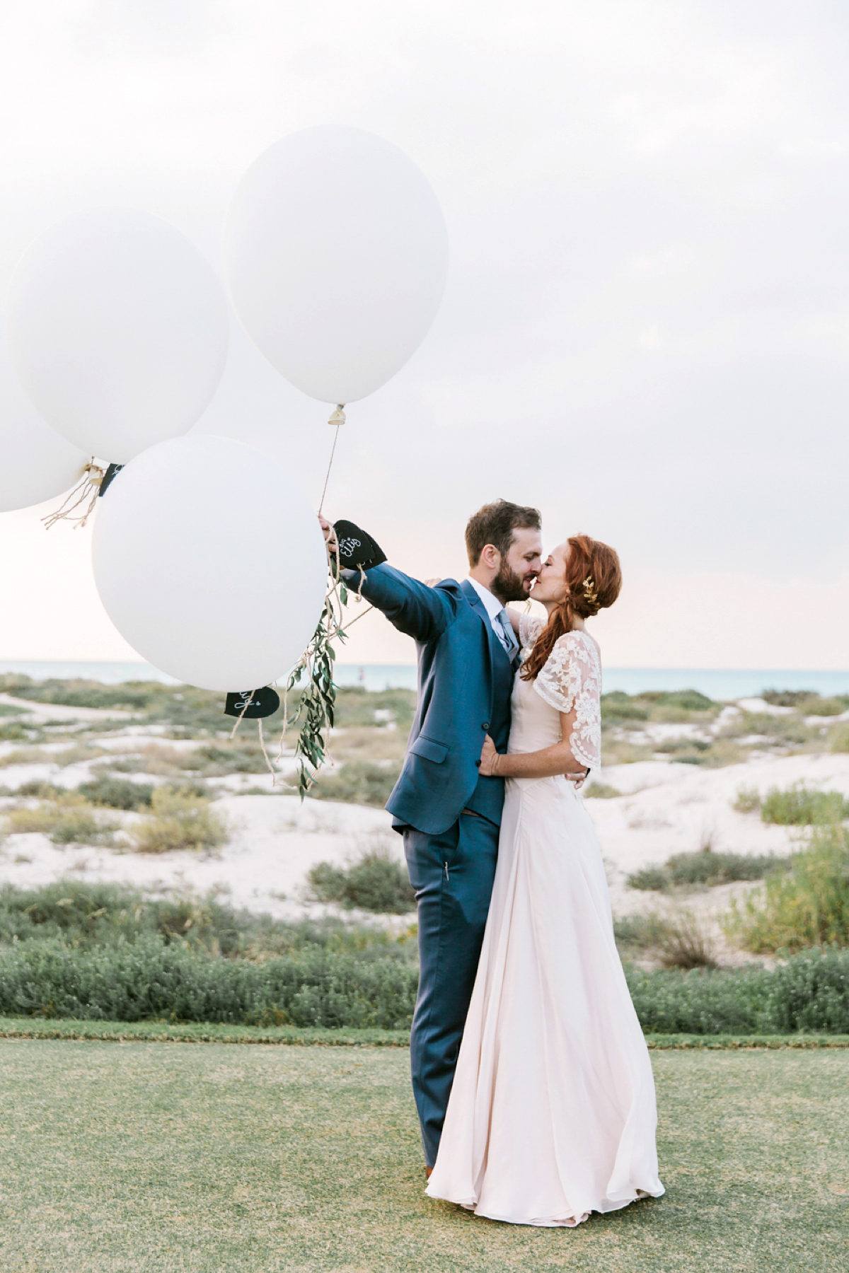 A House of Moirai dres for a stylish boho wedding in Abu Dhabi. Photography by Maria Sundin.