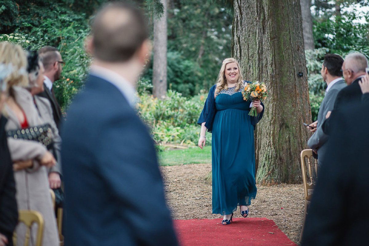 Julia wore a gown by Rowanjoy and a pair of green wedding shoes for her Royal Botanical Gardens wedding in Edinburgh. Photography by Jen Owens.