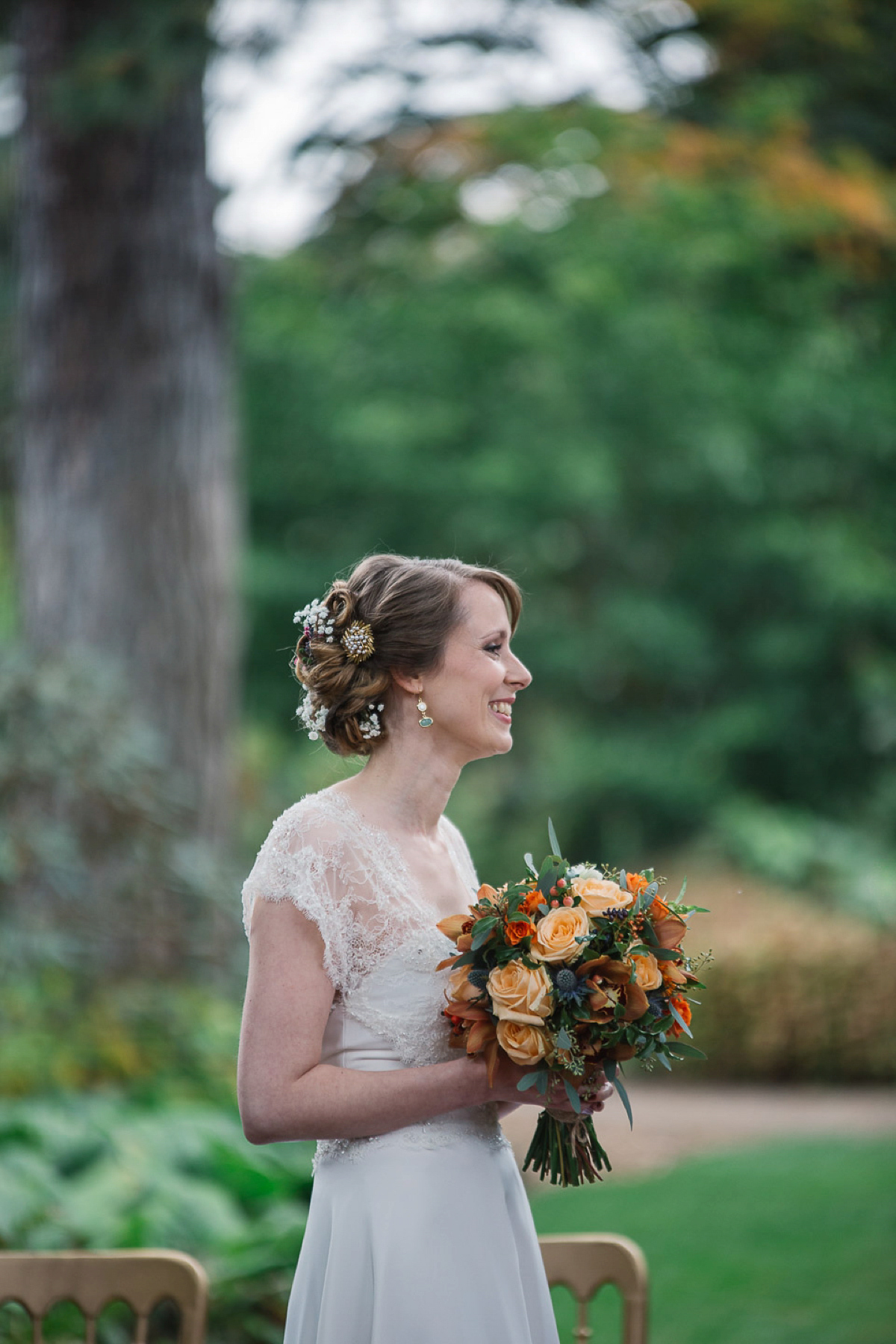 Julia wore a gown by Rowanjoy and a pair of green wedding shoes for her Royal Botanical Gardens wedding in Edinburgh. Photography by Jen Owens.