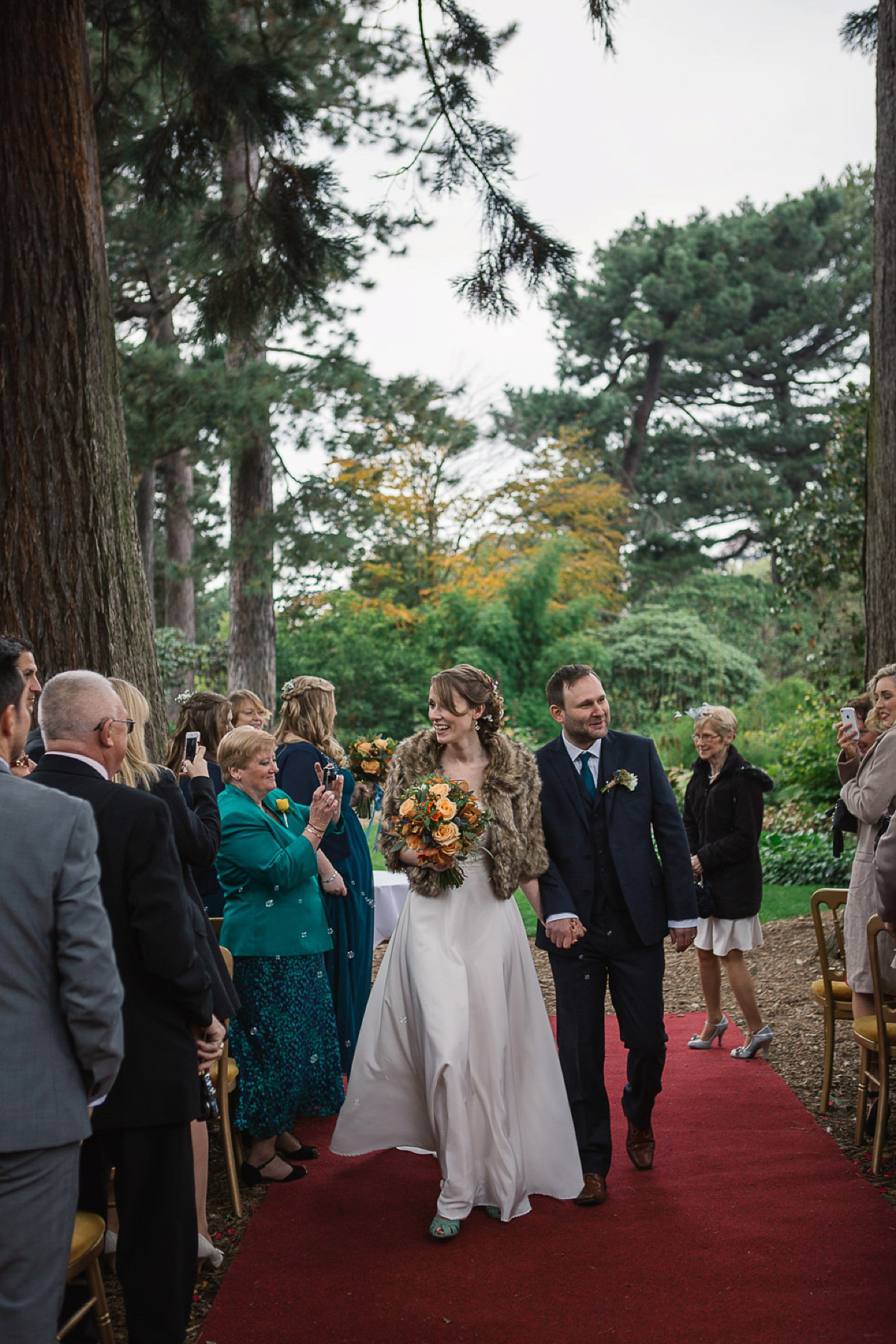 Julia wore a gown by Rowanjoy and a pair of green wedding shoes for her Royal Botanical Gardens wedding in Edinburgh. Photography by Jen Owens.